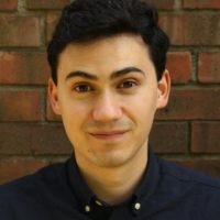 Headshot of Alejandro Naranjo Sandoval smiling