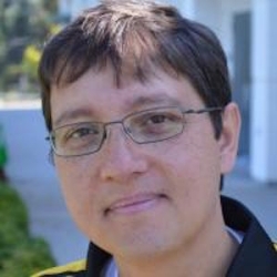 Headshot of Acacio de Barros.