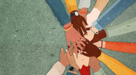 Image of hands crossing together.