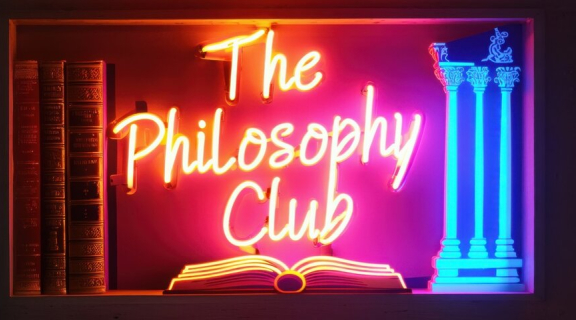 Neon sign reading "Philosophy Club"
